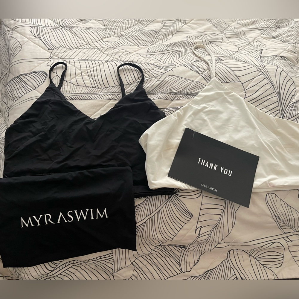 Myra Swim tops, 2, 1 black, 1 white different styles both size medium